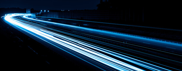 blue car lights at night. long exposure