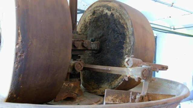 a large millstone from 1850 for mixing clay for refractory bricks