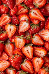 Top view of assorted fresh sliced strawberries. bright color