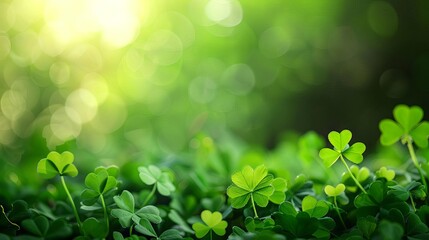 Seamless St. Patrick's Day background with blurred four-leaf clover leaves on green, copy space for text