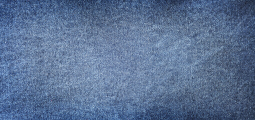 Close-up of blue denim jeans fabric texture background