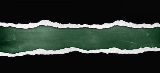 Ripped black paper on green chalkboard background