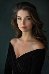 Naklejka premium Model poses gracefully with alluring expression in dark attire against a neutral backdrop, showcasing elegance and poise during a portrait session