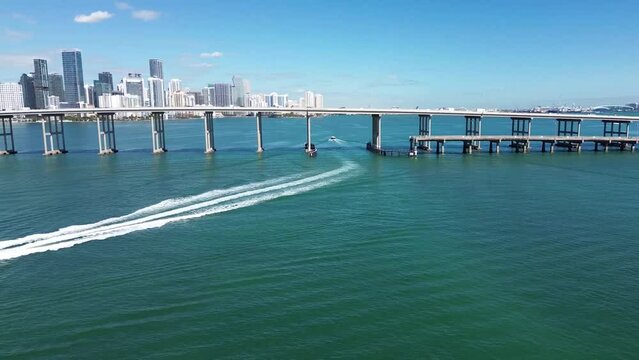Aerial view of Miami waterfront city and Key Biscayne Bridge