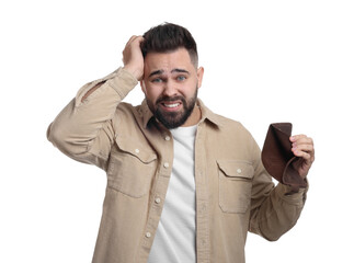 Confused man showing empty wallet on white background