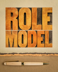 role model -  leadership concept, word abstract in letterpress  wood type on art paper