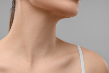 Beauty concept. Woman on grey background, closeup