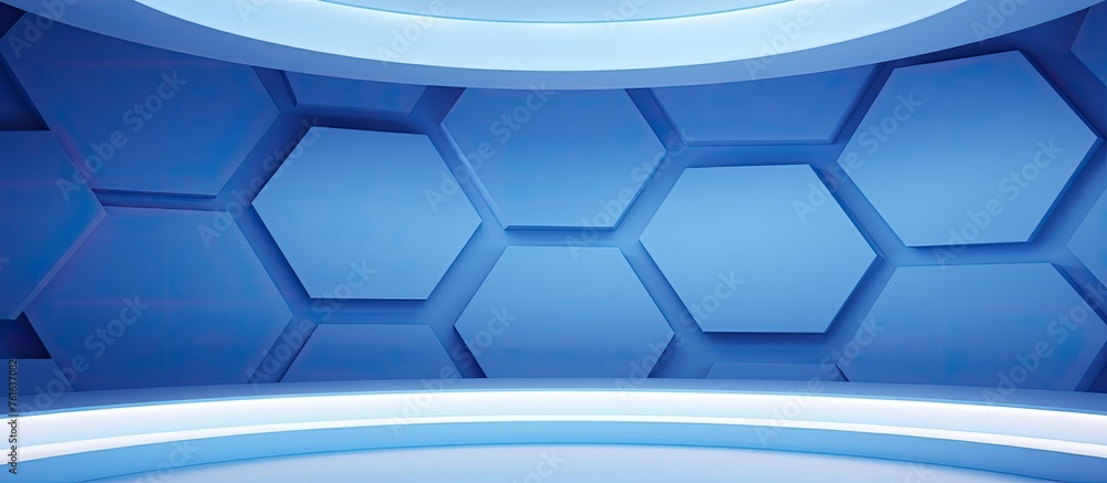 Poster electric blue hexagons on a azure background with a light shining from the ceiling. the liquid patte