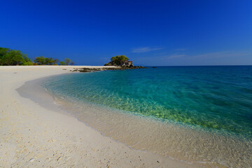 the exotic peaceful tropical island beach. the white sand and clear turquoise sea.