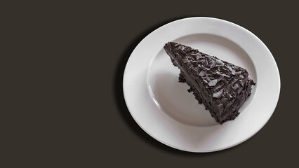 portion of dark chocolate cake dessert