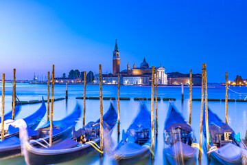 San Giorgio Maggiore and gondolas in Venice at night, Italy