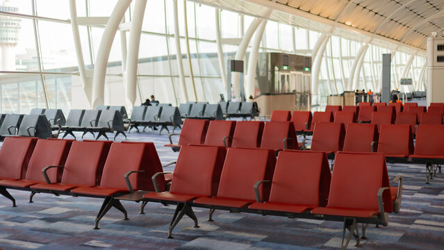 Empty seats in the terminal at the airport boarding gate. airport departure hall for travel and transportation concept.