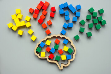 Brain and flows of colored cubes as a concept for learning and neurodiversity.