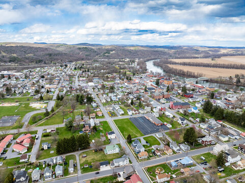 Jersey Shore, PA, USA - 03-17-2024 - Cloudy winter / spring aerial image of the borough, downtown area of Jersey Shore, Pennsylvania. 