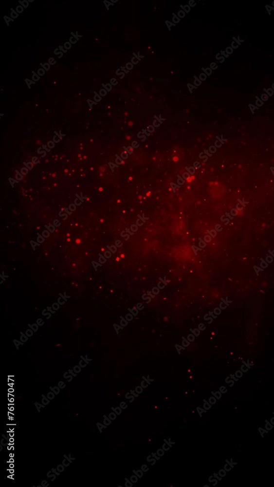 Poster vertical red particles and smoke in black atmosphere 4k loop features red smoke and particles flowin