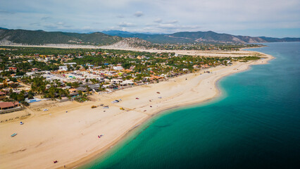 Aerial of Los Barriles  town in La Paz Municipality, Baja California Sur, Mexico desert and beach