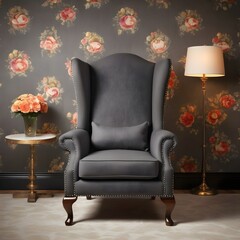 A-classic-wingback-armchair-in-charcoal-grey-fabric--accented-with-nailhead-trim-and-set-against-a-backdrop-of-elegant-wallpaper-and-traditional-decor