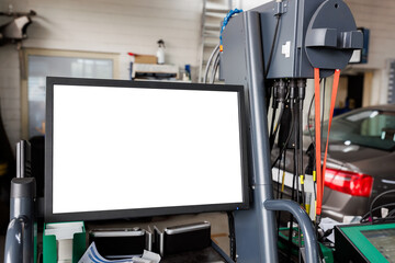 PC computer screen mock up car diagnostic check up. Service auto center garage workshop. Vehicle raised on lift at maintenance station. Automobile repair and check up. Automotive insurance inspection