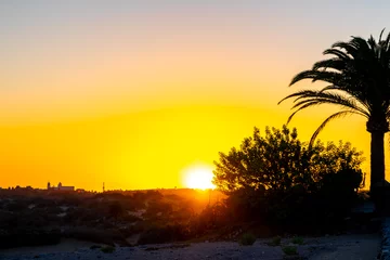 Selbstklebende Fototapeten Sunset, Moon and Evening Sky over Maspalomas on Gran Canary Island Spain. © Sharidan