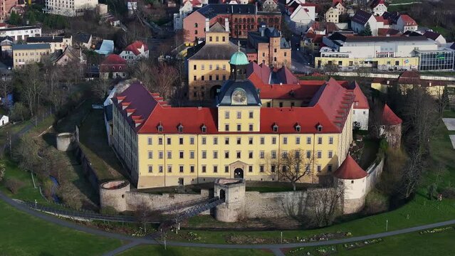 Telephoto shot of Moritzburg Castle in Zeitz. Flight from the south side to the north side of the building. Small town in Saxony-Anhalt.