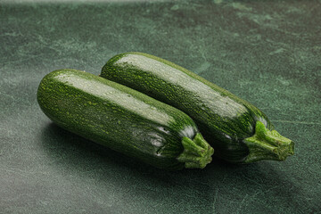 Raw green ripe zucchini vegetable