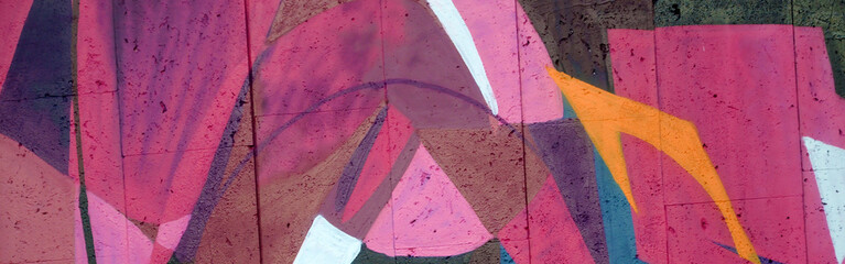 Colorful background of graffiti painting artwork with bright aerosol outlines on wall. Old school...