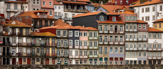 Facades of the city of Porto, with its colorful houses and windows