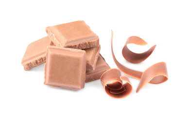 Delicious chocolate shavings and pieces isolated on white