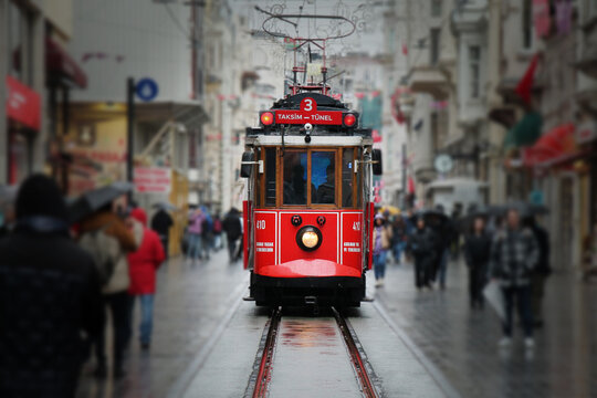 Vintage tram on the street of Istanbul close-up. Touristic popular destination - Taksim Istiklal Street. Istanbul, Turkey