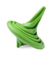 One green spinning top isolated on white