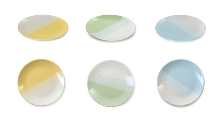 Clean ceramic plates isolated on white, top and side views