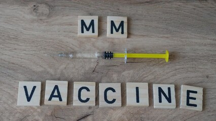 MMR vaccine concept which protects against measles, mumps, rubella, and varicella (chickenpox). 