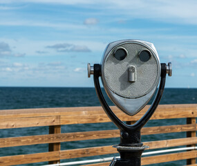 coin operated binoculars on beach