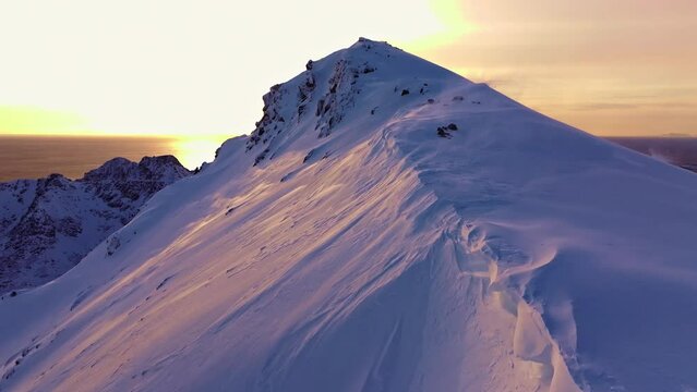 Aerial view of the Lofoten fiords, Norway, covered by snow in winter. peaks winter mountains