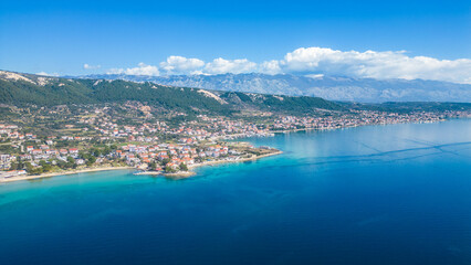 Fototapeta premium Behold the enchanting beauty of the historic town of Rab, nestled on the picturesque island of Rab in Croatia сaptured from a drone