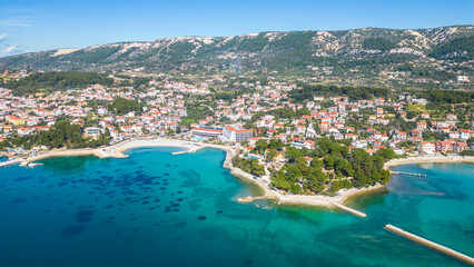 Behold the enchanting beauty of the historic town of Rab, nestled on the picturesque island of Rab...