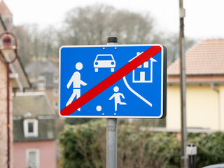 End of a living street sign in a residential district. Traffic symbol when leaving an area with...