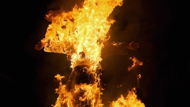 Burning an effigy of the victim at the stake.Witch rituals,Halloween.Burning witches in the dark is a religious tradition.A nightmare,horror.The mystery of evil,magic and mysticism.Esoteric sacrifice