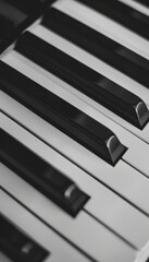 Monochrome close up image of a black and white piano keyboard for a detailed view