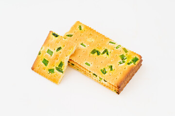 Chive biscuits on white background