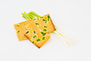 Chive biscuits on white background