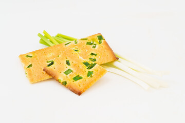 Chive biscuits on white background