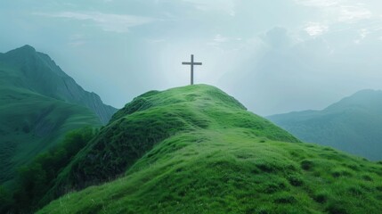 Christian cross on top of a green hill - obrazy, fototapety, plakaty