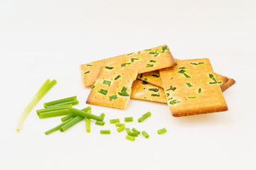 Chive biscuits on white background