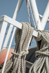 Nautical Rope Tied on Ship's White Railing