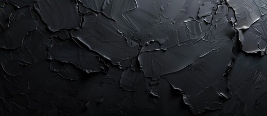 A close up of a dark grey monochrome painting on a black background, capturing a mysterious and...