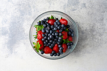 Blueberry and strawberry in glass  bowl