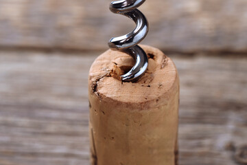 Wine cork and corkscrew macro photography. Perfect background for wine and restaurant-related concepts.