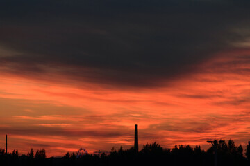 Black and red heavy sky after sunset, evening dark twilight