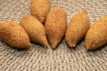 Kibbet Lebanese food, traditional Arabic snack, Kibbe is a fried food filled with minced meat, characterized by its ovoid shape finished with two pointed ends.